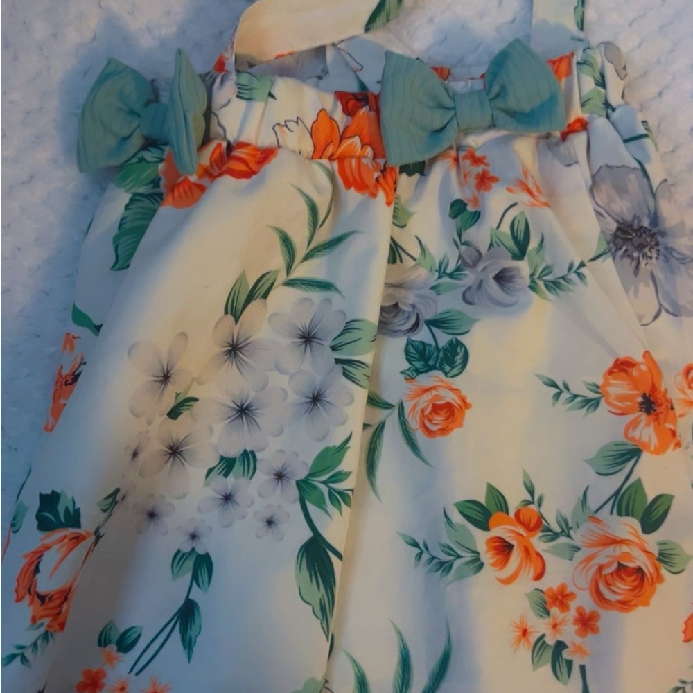 Floral Sleeveless Dress with Bow Accents
